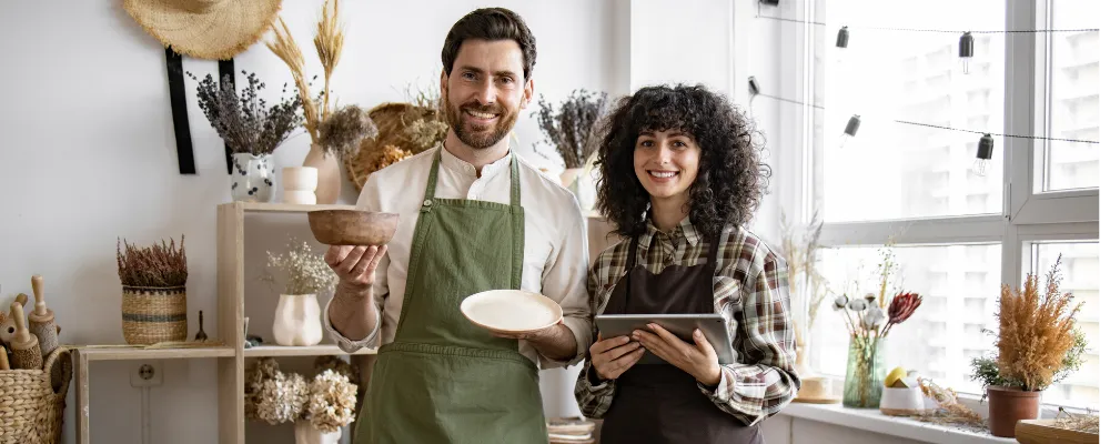 A couple running a craft shop dealing with credit card processing for small businesses.