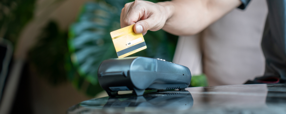 Customer swiping card as part part of the front-end processing process.