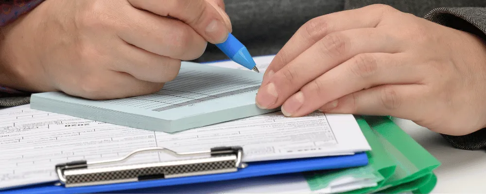 A woman filling out an EIN document.