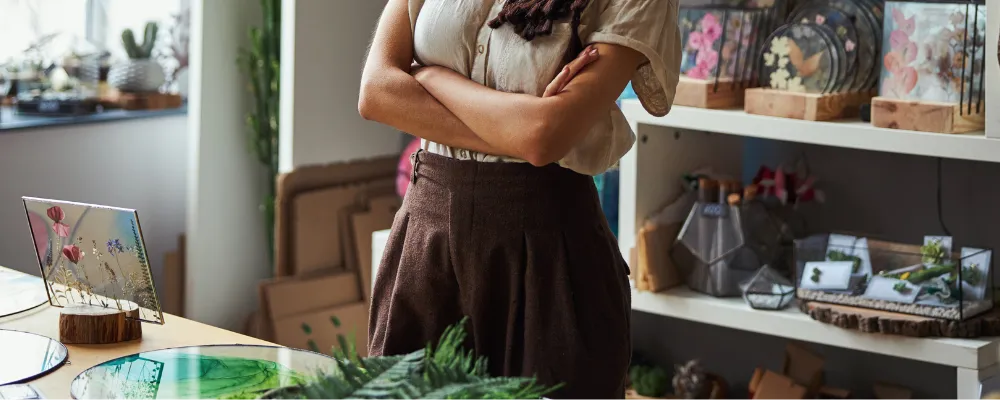 Merchant using a credit card reader for a craft fair.