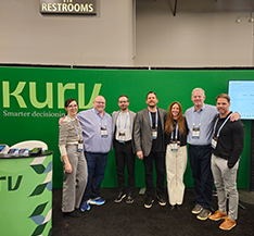 Kurv staff at a conference.
