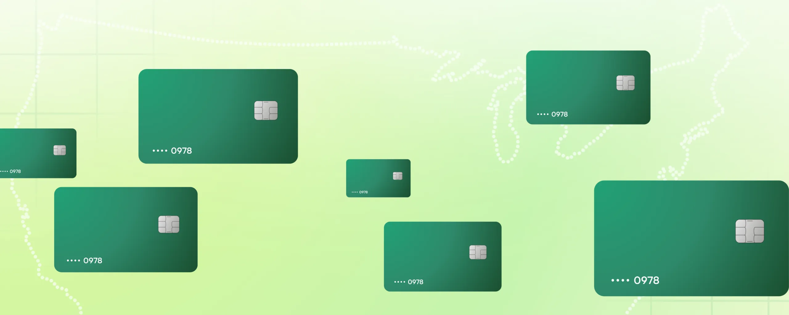 Green Credit Cards falling in front ofthe outline of a map of the US.
